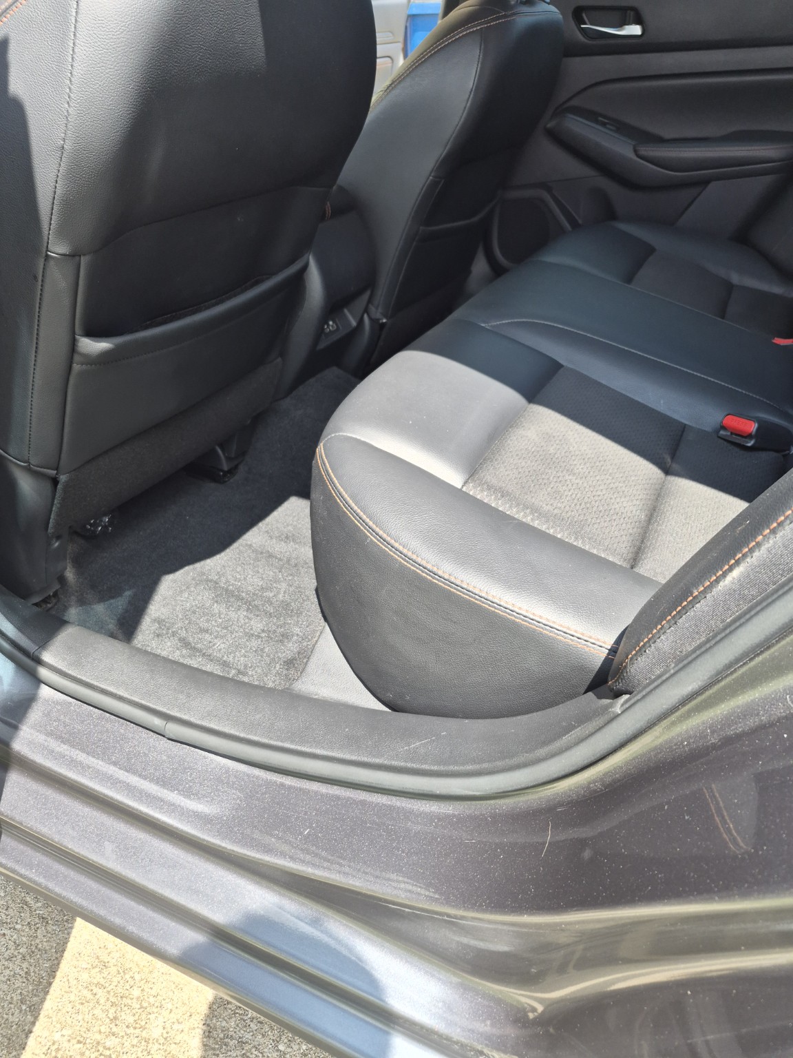 Clean car rear seat and floor after interior detailing