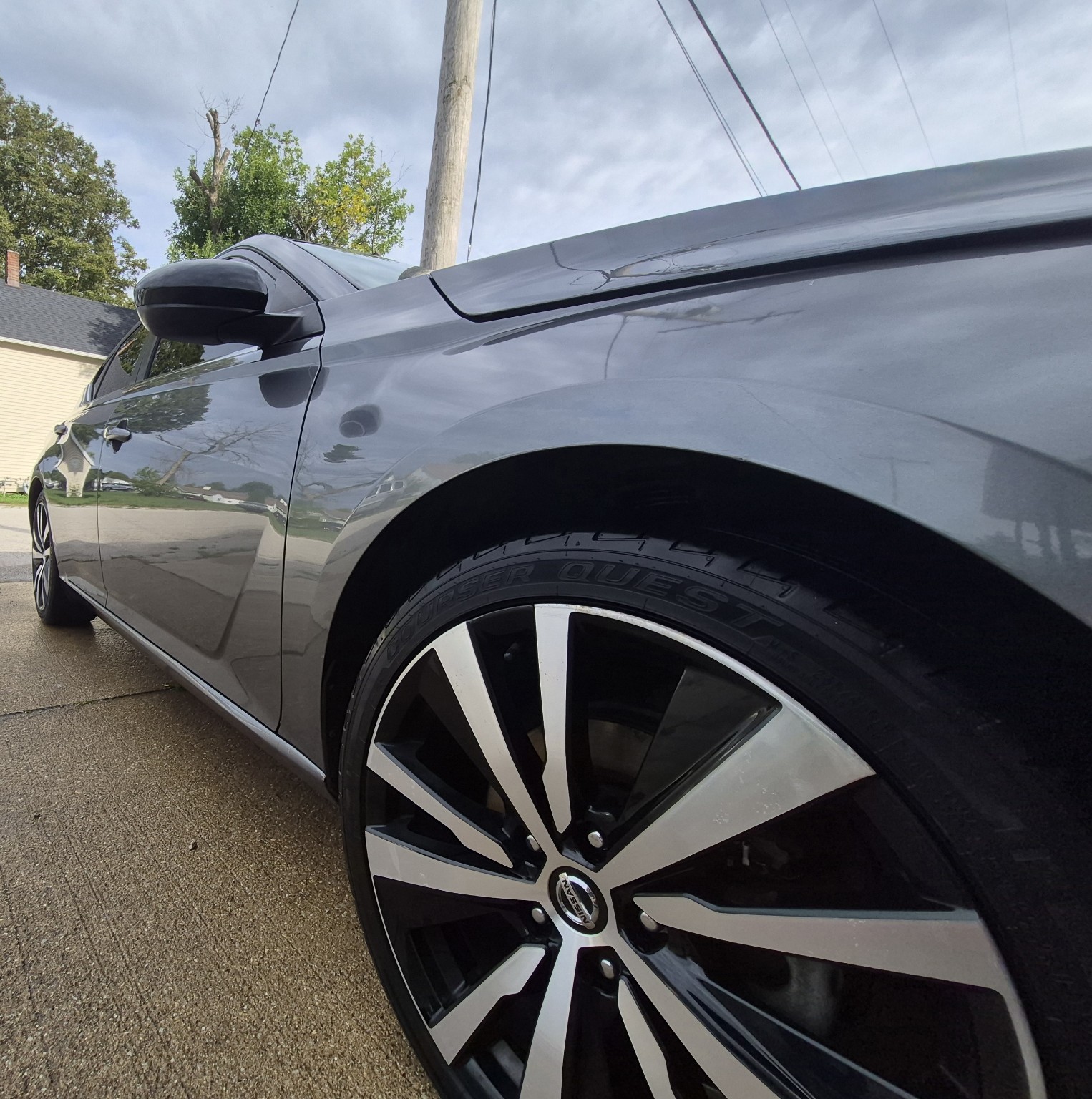 Glossy Nissan paint protected with 30-day wax
